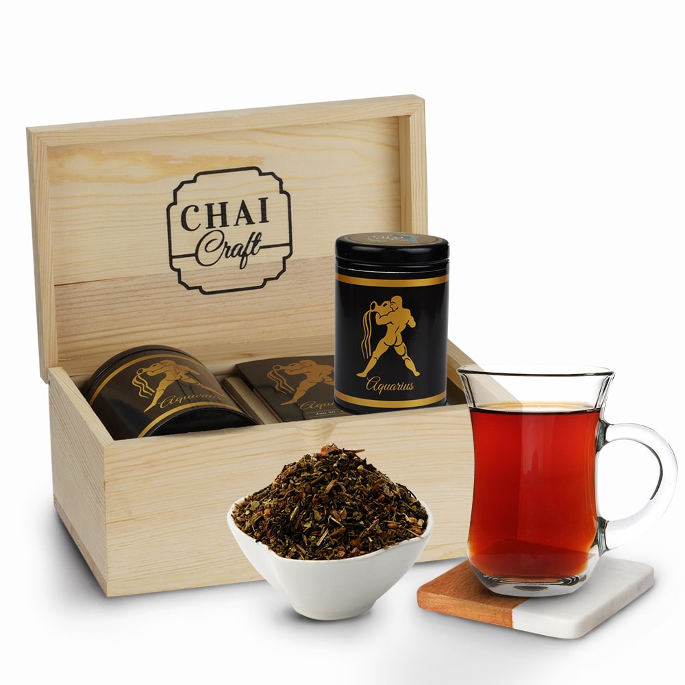 Tea Blends for Zodiac sign chai craft aquarius tea box with tin can and loose leaf tea with brewed tea on the side