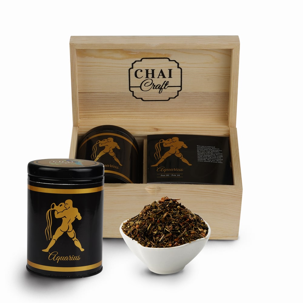 Tea Blends for Zodiac sign chai craft aquarius tea box with tin can and loose leaf tea in a white cup